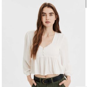 AE SMOCKED LONG SLEEVE PEPLUM BLOUSE